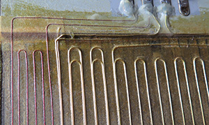 rear of Magnepan SVGa showing mylar film with the mid/bass wires and thinner high frequency strip on leftheavier 