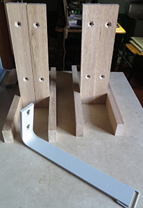 The unvarnished oak legs with original steel stands in foreground